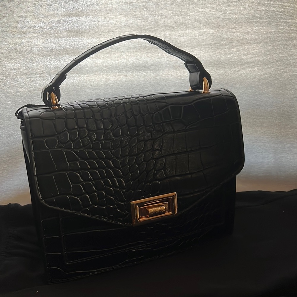 BRAND NEW WITH TAGS! black leather crossbody pretty little thing bag!!